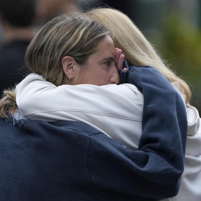 Officer, bystanders hailed for confronting and stopping a man who killed 6 at a Sydney shopping mall